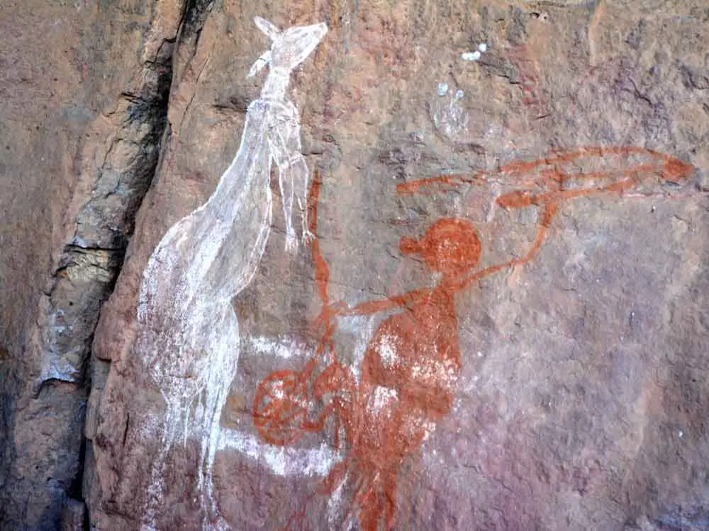 Nourlangie Rock art - Painting of mimi spirit throwing spear at kangaroo at Nourlangie Rock