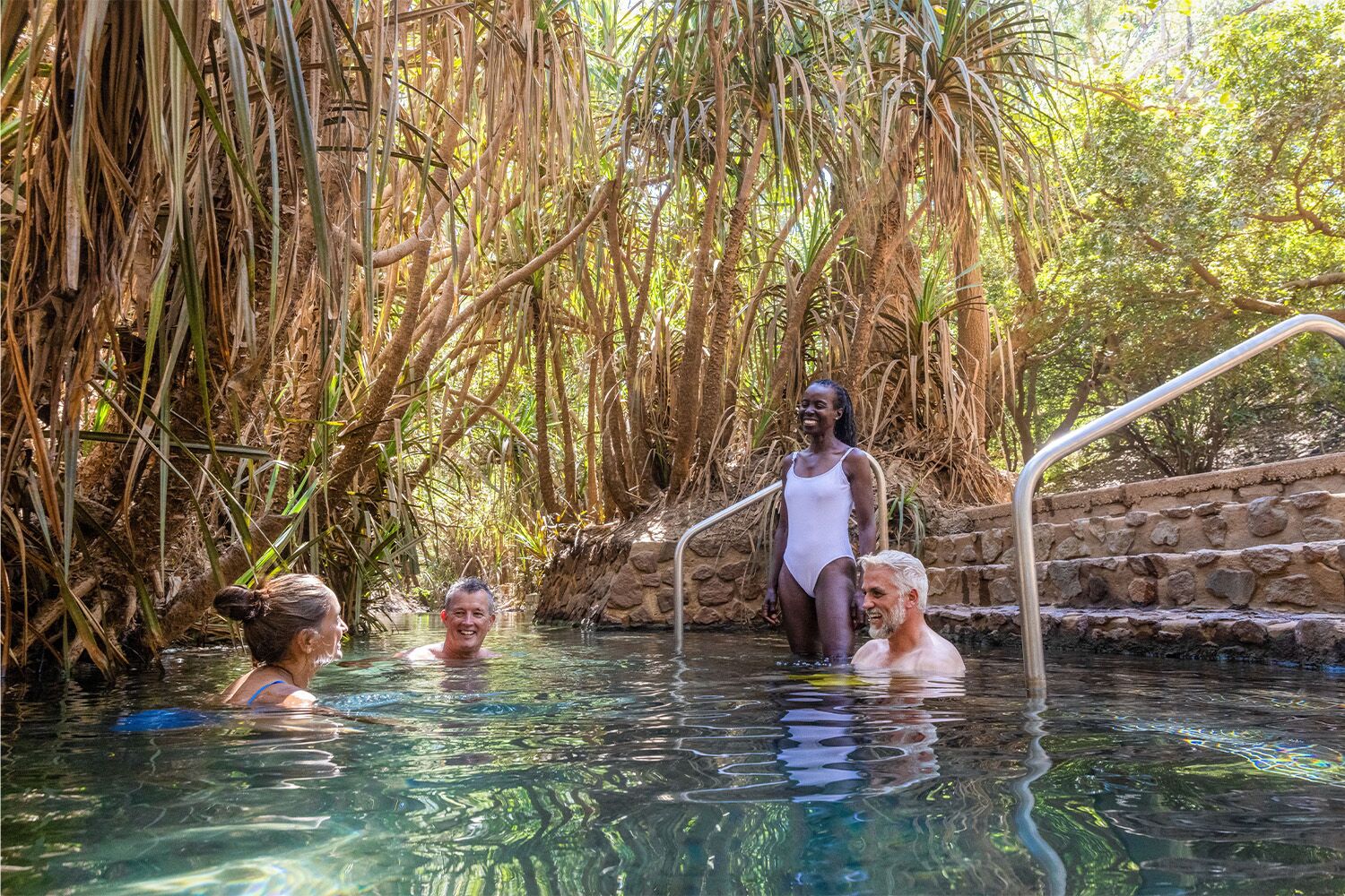 Kathrine Hot Springs being enjoyed by 4 people.