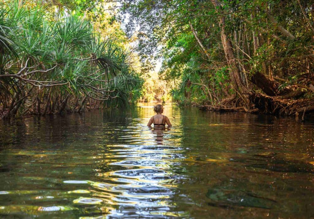 Girl sitting in the water at Berry Springs during the Litchfield Day Tour